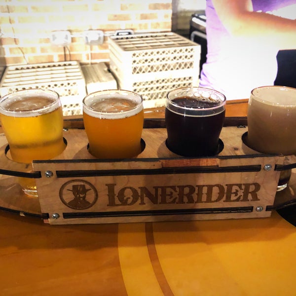 Photo taken at Lonerider Brewing Company by Kurt G. on 8/7/2018