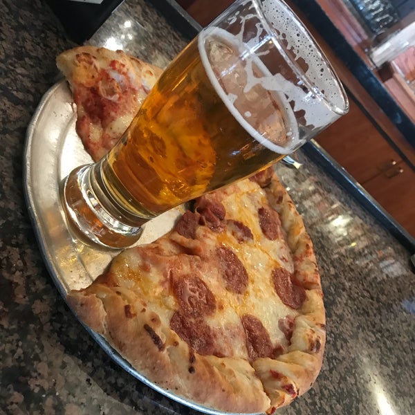 Photo taken at Backcountry Pizza &amp; Tap House by Tom H. on 4/13/2018