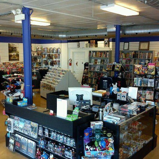 Photo taken at Comix Revolution by Comix Revolution on 12/6/2014