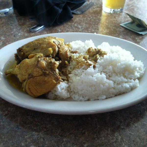 Photo taken at Jamaica Gates Caribbean Restaurant by Luxury on 12/26/2012