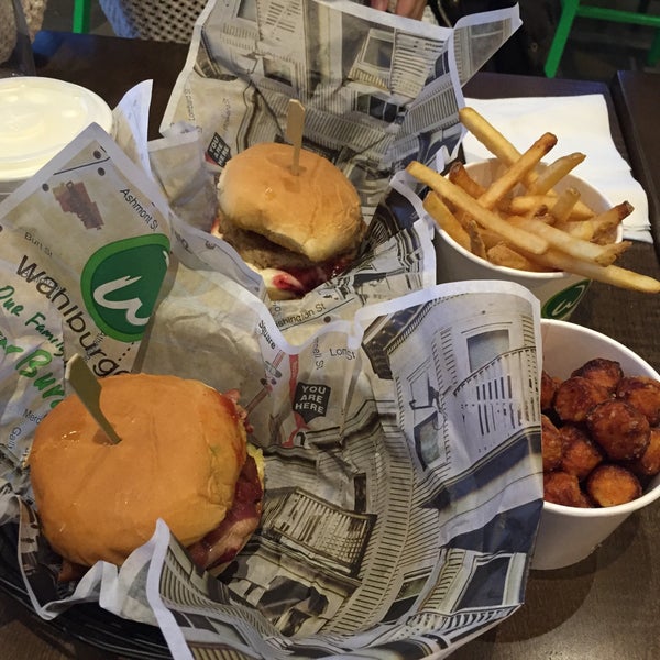 Photo taken at Wahlburgers by Danny T. on 12/31/2014