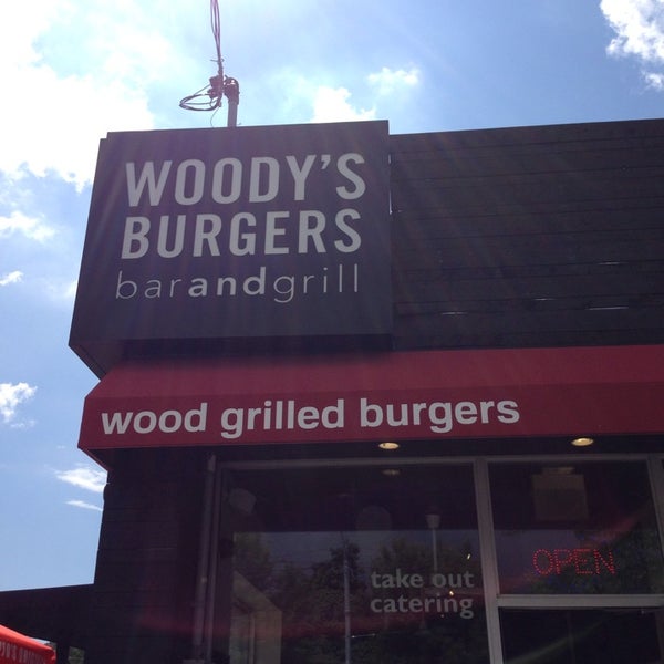 Photo taken at Woody&#39;s Burgers bar and grill by Danny T. on 8/21/2014