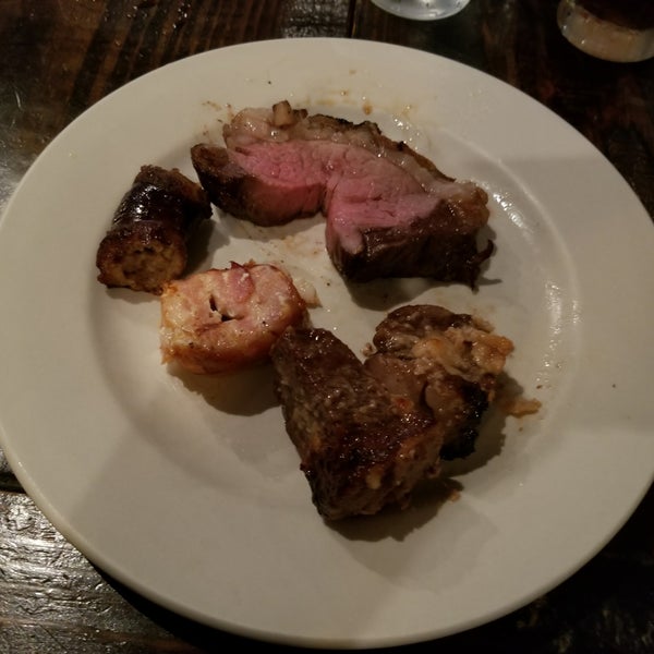 Photo taken at Blue charcoal Steakhouse by Troy on 2/20/2018