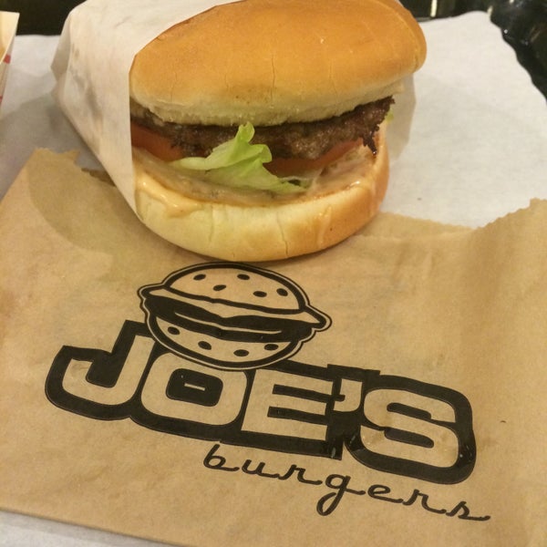 Photo taken at Joe&#39;s Burgers by Chris T. on 12/12/2014