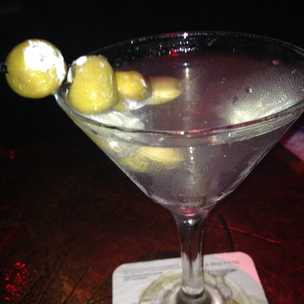 Photo taken at Deja Vu Martini Lounge by Luke L. on 6/24/2014