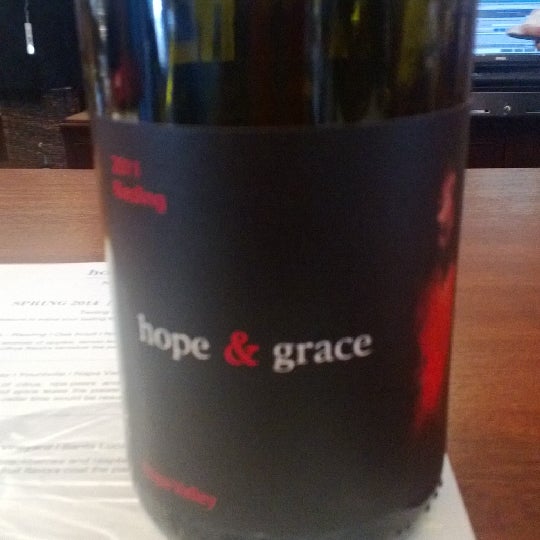 Photo taken at hope &amp; grace Wines by Stacey S. on 6/22/2014