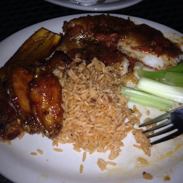 I'm blown away, really amazing Caribbean dishes - I had the Jerk Grouper & Shrimp w/ rice & peas & fried plantains = delicious! It had a spicy but slightly sweet sauce all over the fish. I loved it!