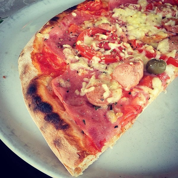 Photo taken at Pizzeria Gallus by San C. on 4/30/2014