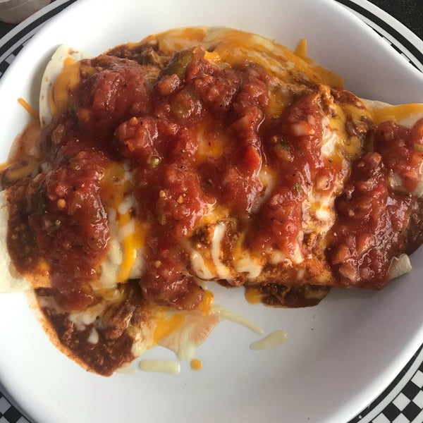 Ordered the Smothered Burrito for breakfast: two large tortillas filled with tasty eggs/potatoes smothered in Chili with cheese (so they are actually ENCHILADAS!). All very tasty.