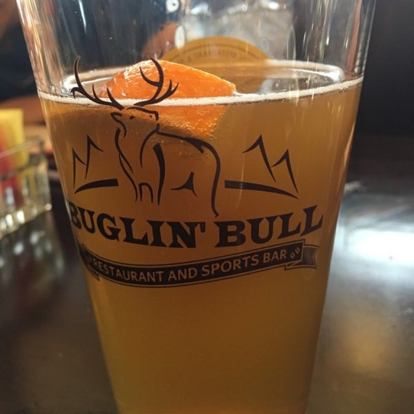 Photo taken at Buglin&#39; Bull Restaurant and Sports Bar by E H. on 12/28/2016