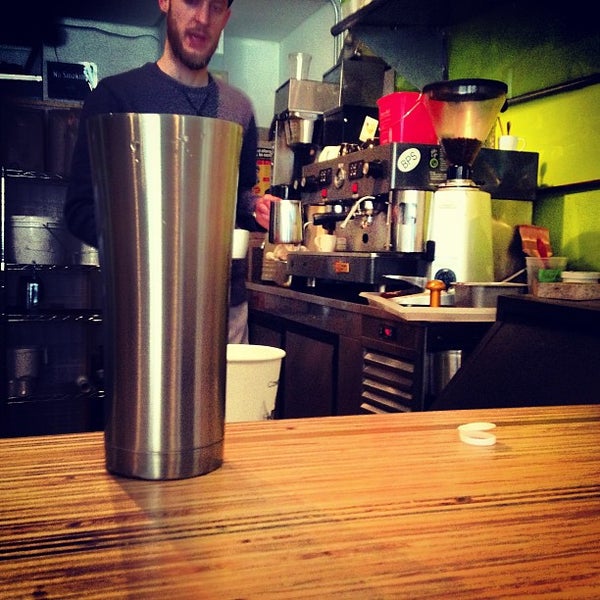 Photo taken at Continuum Coffee by Kirsten P. on 1/26/2013