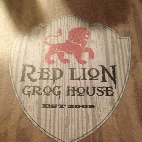 Photo taken at Red Lion Grog House by Joe P. on 6/14/2013