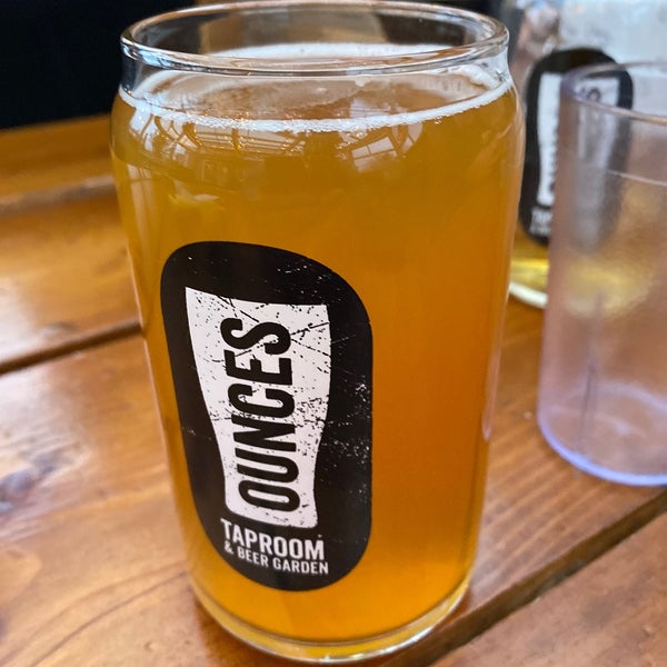 Photo taken at Ounces Taproom &amp; Beer Garden by Andrew M. on 4/29/2021