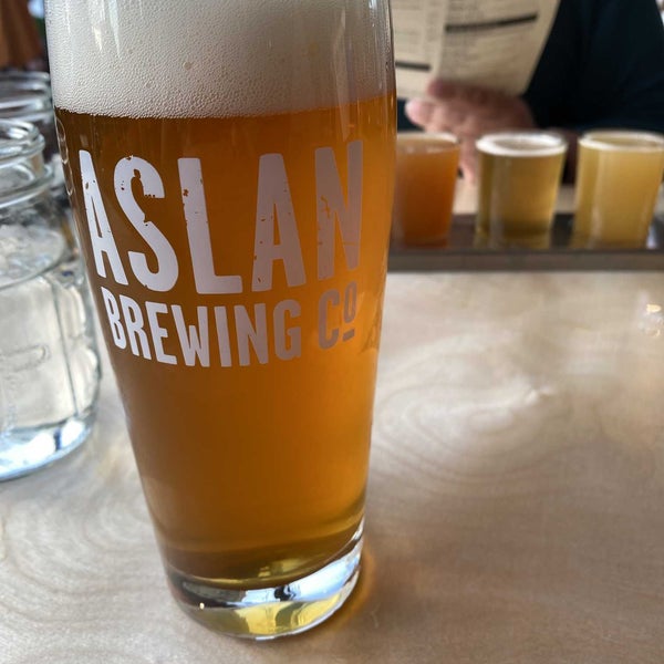 Photo taken at Aslan Brewing Company by Andrew M. on 5/21/2022