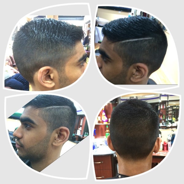 Photo taken at Ace of Cuts Barber Shop by Abo S. on 7/1/2014