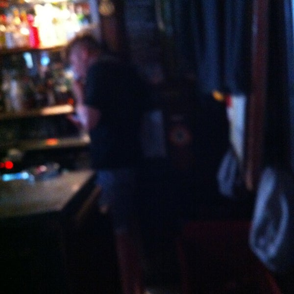 Photo taken at Jinty McGuinty&#39;s Irish Bar by Tadas on 7/26/2013