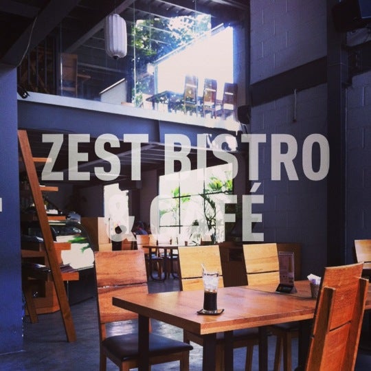 Photo taken at Zest Bistro &amp; Café by Vinh V. on 3/17/2013