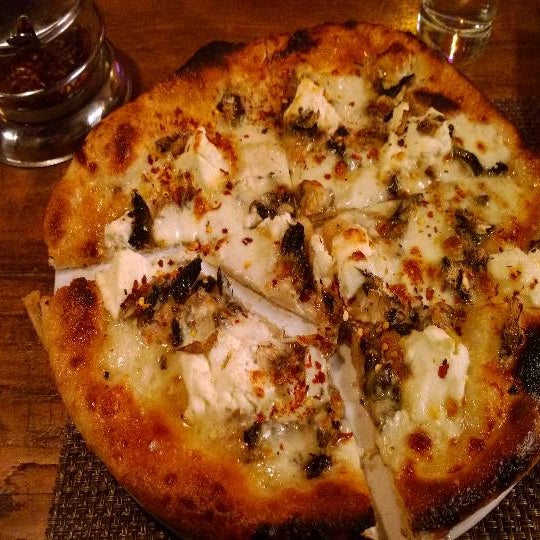 If you like cheese and mushrooms try the Tartufo Bianca pizza. Really good.