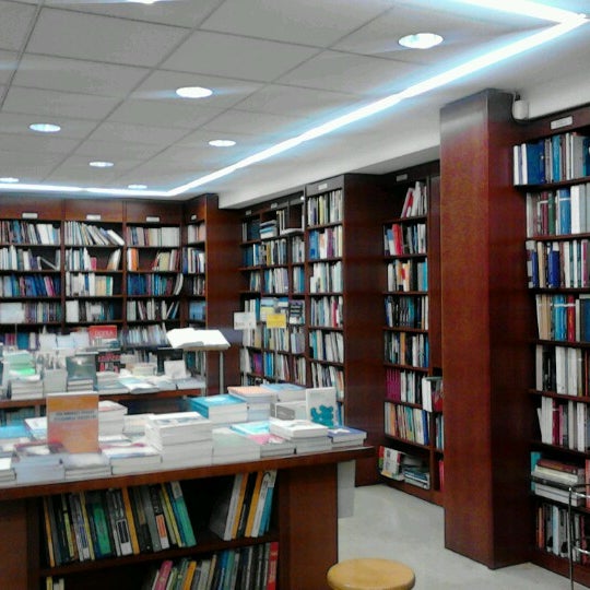 Photo taken at Politeia Bookstore by MADELEINE A. on 1/3/2013