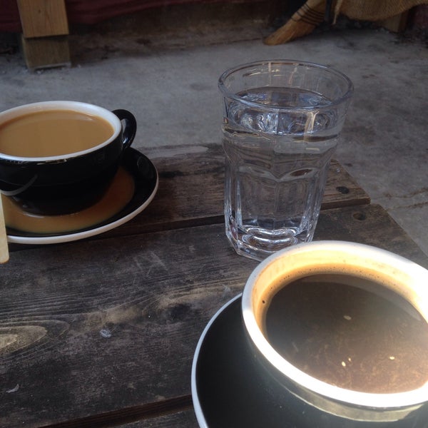 Photo taken at Qualia Coffee by Claire L. on 4/11/2015