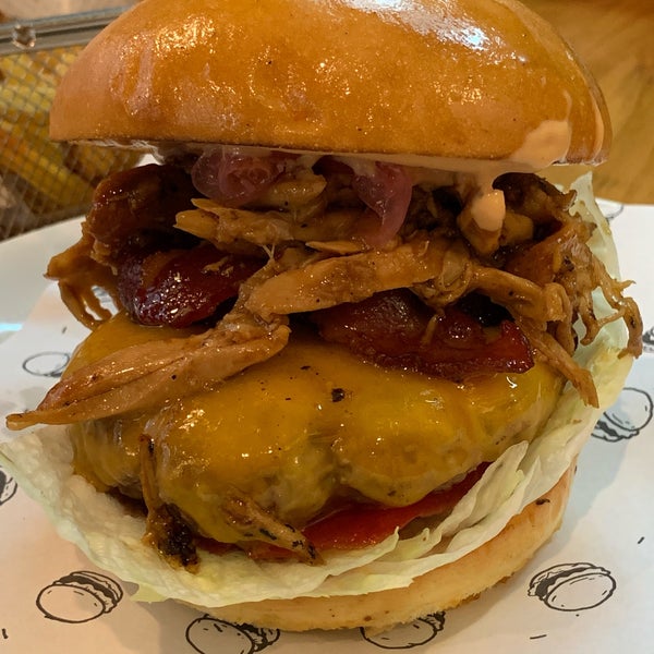 Photo taken at Boom! Burgers by Nick J. on 4/11/2019