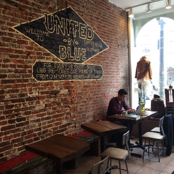 Photo taken at United By Blue Coffeehouse and Clothier by Rachel on 3/21/2015