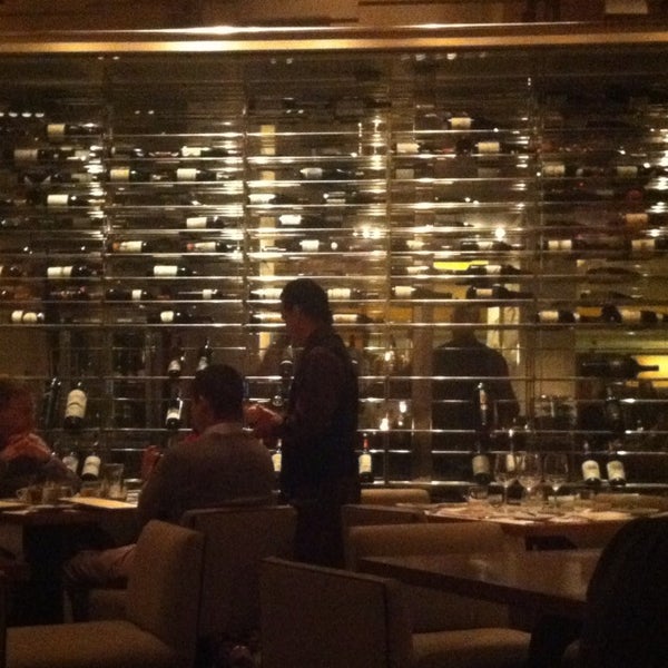 Photo taken at Wolfgang Puck American Grille by Christopher J. on 2/12/2013