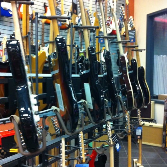 Photo taken at Long &amp; McQuade Musical Instruments by Yamilet on 7/7/2012