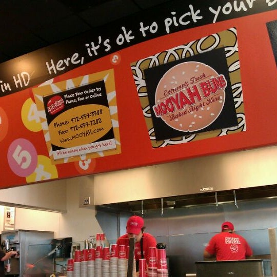 Photo taken at MOOYAH Burgers, Fries &amp; Shakes by Roxanne on 2/7/2012