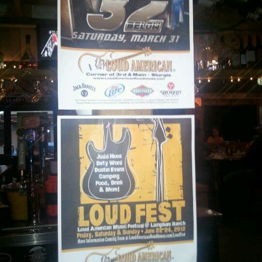 Photo taken at Loud American Roadhouse by Molly M. on 3/12/2012