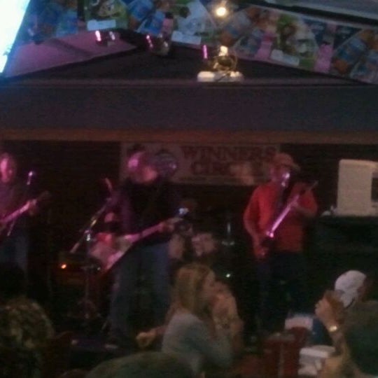 Photo taken at Winners Circle Sports Bar &amp; Grill by Chrissanne L. on 3/4/2012