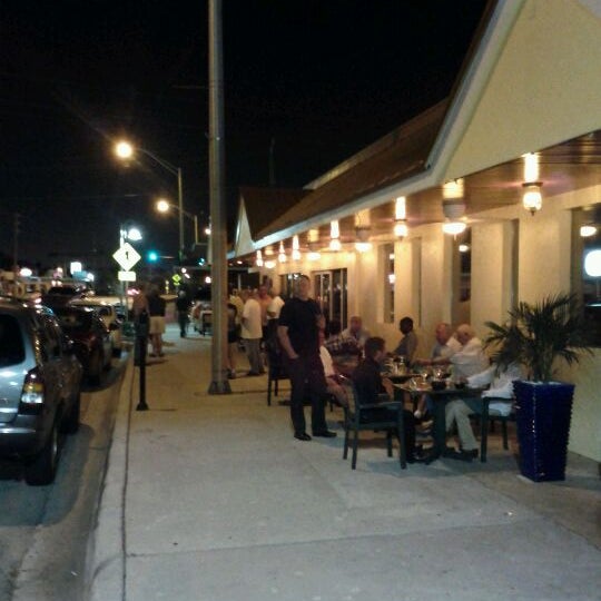 Photo taken at Tropics Piano Bar &amp; Restaurant by David S. on 3/3/2012