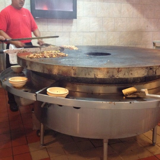 Photo taken at CrazyFire Mongolian Grill by Mike S. on 3/21/2012