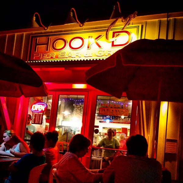 Photo taken at Hook&#39;d Pier Bar &amp; Grill by Heather C. on 10/9/2015