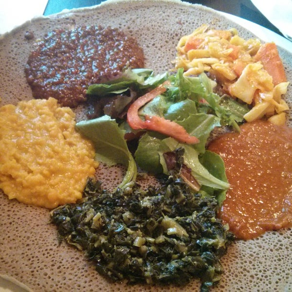 A typical Ethiopian veggie combo serves 2 people. Good food and surprisingly quick service. Ask for chilli powder if u like spice . Check-in on Yelp might get you a free side dish.