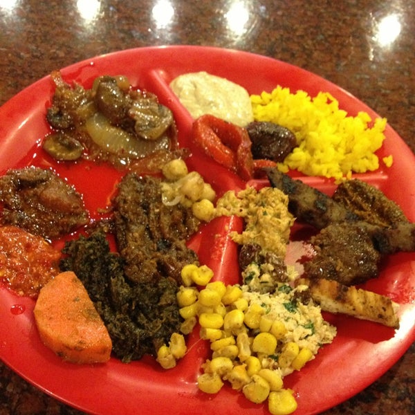 Photo taken at Poccadio Moroccan Grill &amp; Sandwiches by Rae K. on 1/2/2013