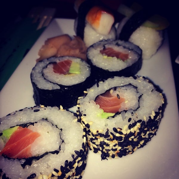 Photo taken at Natural Wok + Sushi Bar by Elena G. on 1/5/2014