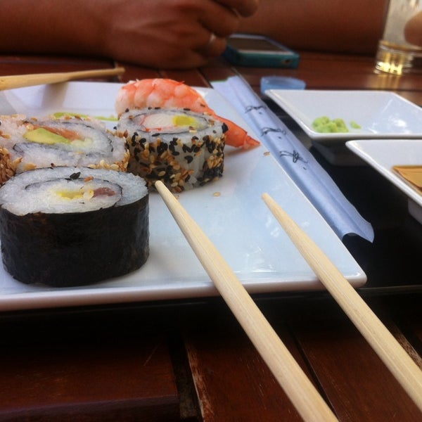 Photo taken at Natural Wok + Sushi Bar by Elena G. on 9/22/2013