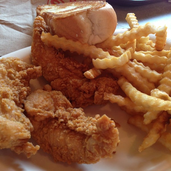Photo taken at Raising Cane&#39;s Chicken Fingers by Kimberly R. on 2/14/2013