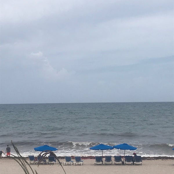 Photo taken at Pelican Grand Beach Resort &amp; Spa by Kerry on 7/6/2019