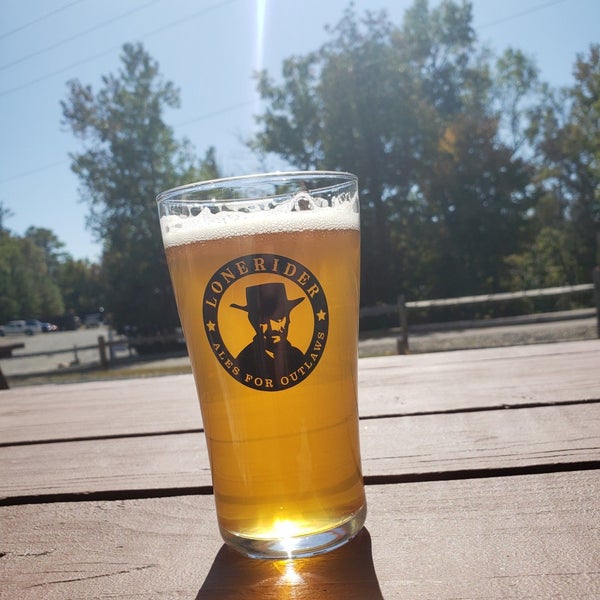 Photo taken at Lonerider Brewing Company by Tyler C. on 10/14/2019