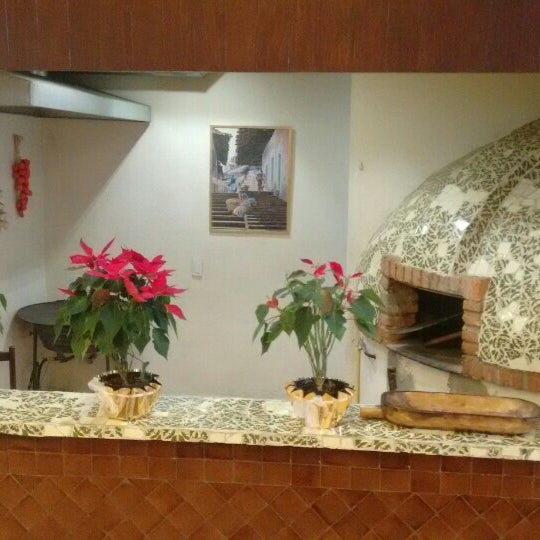 Foto diambil di Restaurante La Romería oleh AZu C. pada 12/21/2015