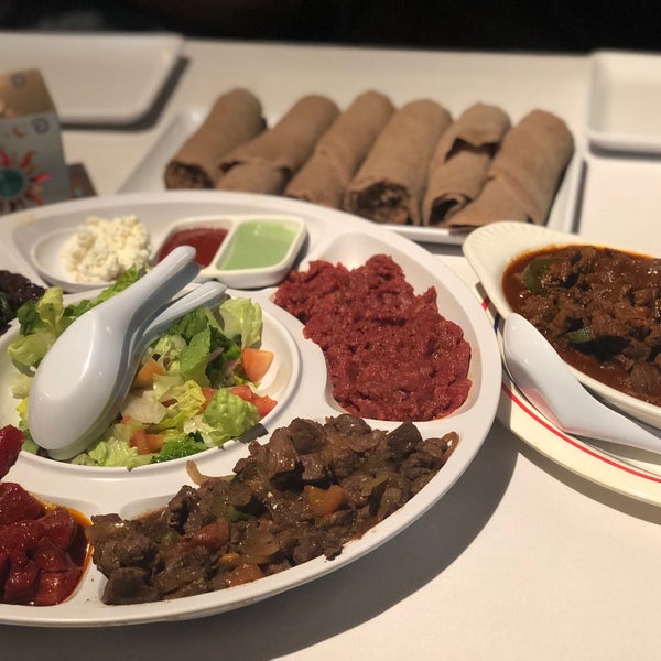 Photo taken at Lucy Ethiopian Restaurant &amp; Lounge by Jessica H. on 1/7/2018