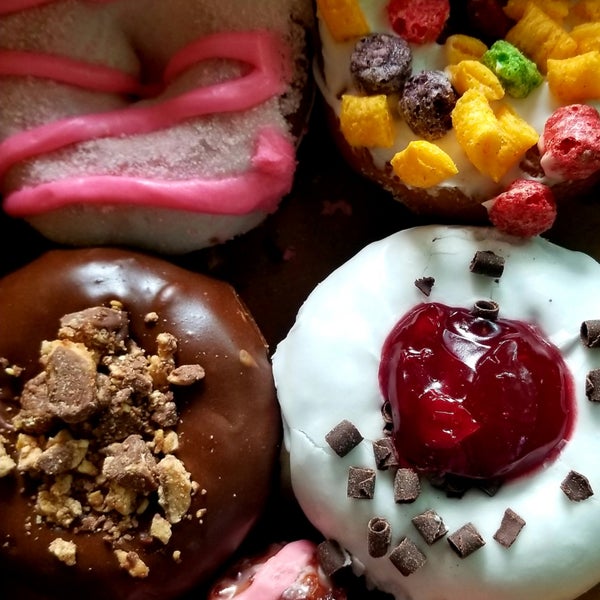 Photo taken at Holey Schmidt Donuts by Lisa on 8/4/2018