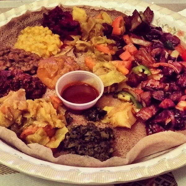 Photo taken at Lalibela Restaurant by Lionel C. on 1/8/2014