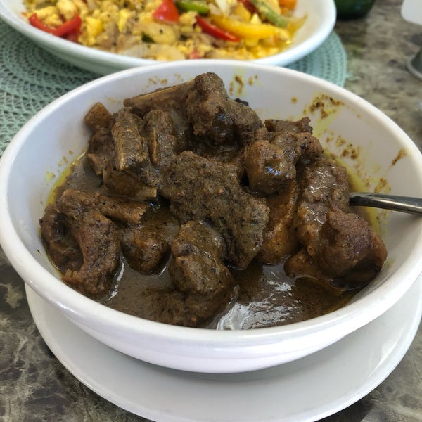 Photo taken at Ackee Bamboo Jamaican Cuisine by Jeff W. on 10/4/2019