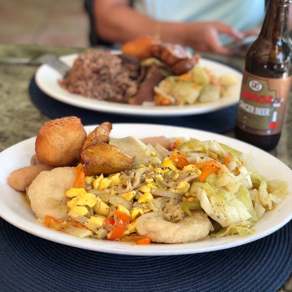 Photo taken at Ackee Bamboo Jamaican Cuisine by Jeff W. on 7/28/2019