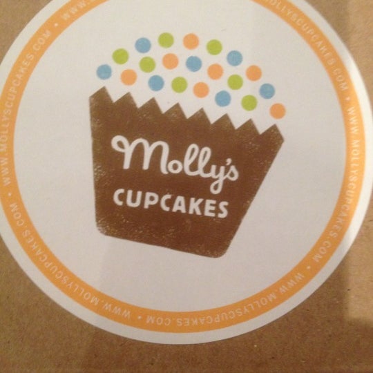Photo taken at Molly&#39;s Cupcakes by Ron A. on 12/28/2012