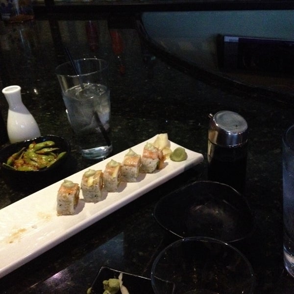 Photo taken at Pearl Sushi Lounge &amp; Bomber Bar by Travis K. on 4/19/2014