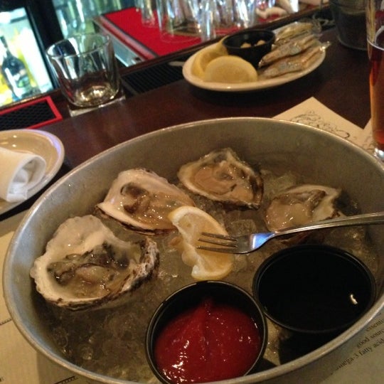 Photo taken at Doc Magrogan&#39;s Oyster House by Janet D. on 11/18/2012